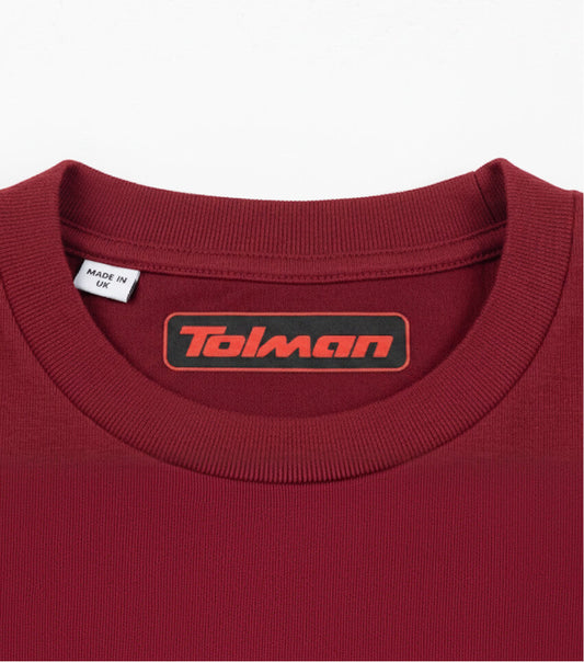 Custom red DTF neck label printed inside a burgundy T-shirt