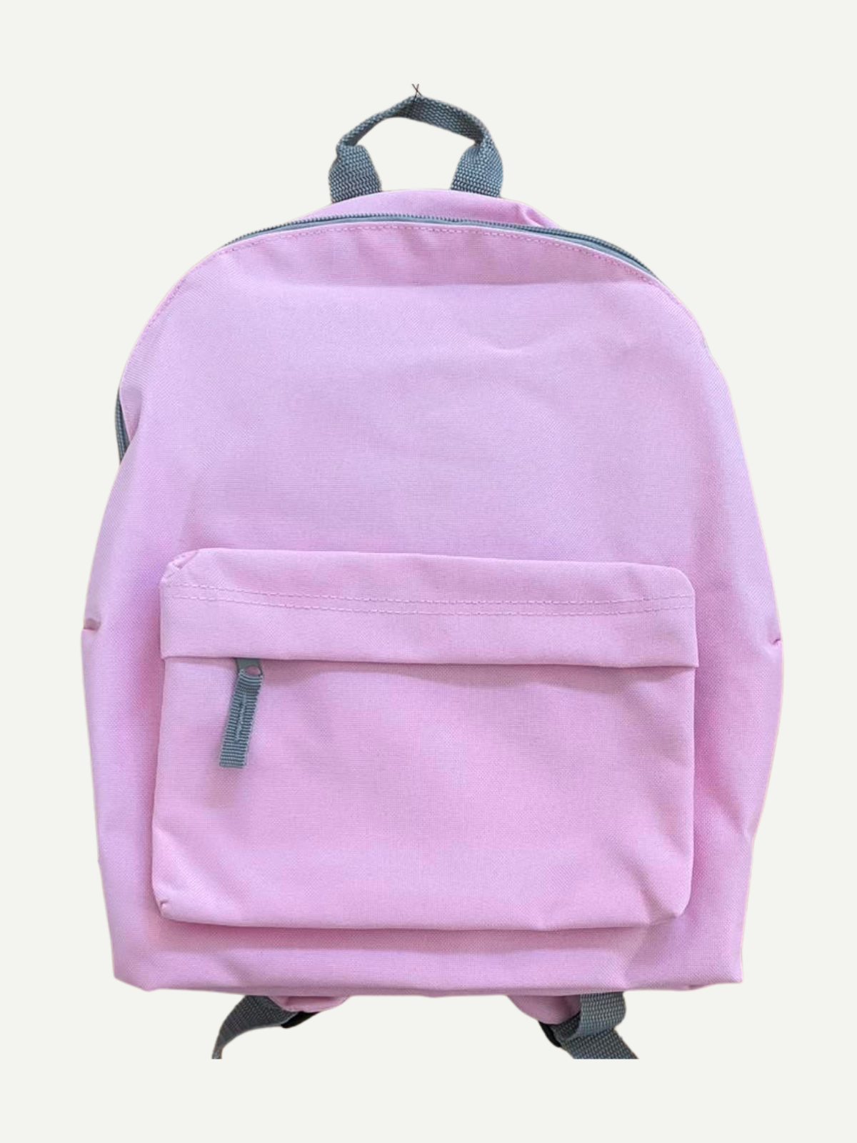 Plain pink children’s backpack with grey trim, a front zipped pocket and top carry handle, shown before personalisation.