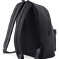 Rear view of a black children’s backpack showing the padded back panel, adjustable padded shoulder straps and top carry handle.