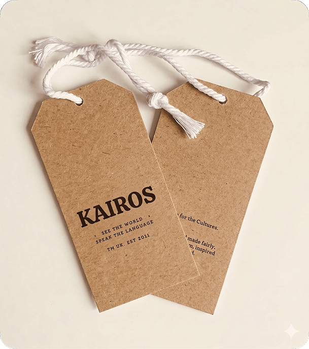 Two custom printed kraft swing tags with KAIROS branding and white cord attachments