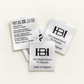 Custom printed satin care labels showing washing symbols, branding and fabric composition