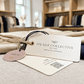 Custom printed silk swing tags with black cord, size tag and QR code displayed in a clothing shop