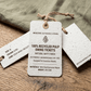 Custom recycled pulp swing tags with natural matt finish and twine cord