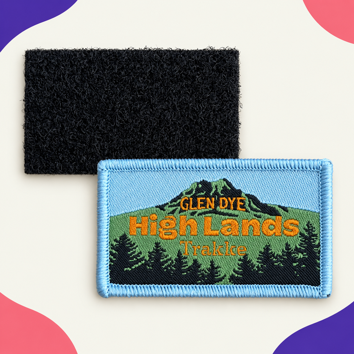 Custom woven Highlands trail badge with separate black hook-and-loop backing