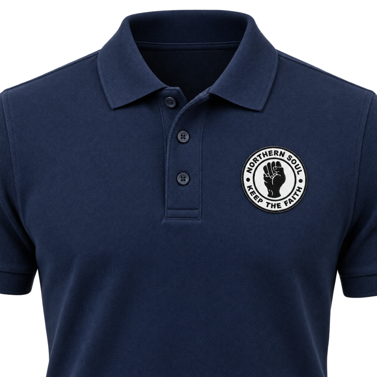 Custom woven self-adhesive badge applied to a navy polo shirt