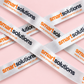 Full-colour logo printing on custom white satin clothing labels against a pink background