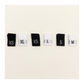 Black and white woven clothing size labels in assorted sizes