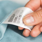 Custom printed wash care labels supplied on a roll