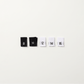 Black and white woven women’s clothing size labels in UK sizes 8 to 16